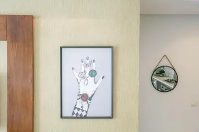 a picture of a giraffe on a wall at Résidence Eden - Maarif in Casablanca