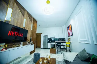 a living room with a couch and a kitchen at casablanca maroc in Casablanca