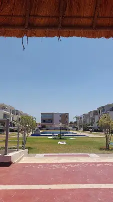 a view of a park with buildings in the background at Appartement Alaa in Mansouria