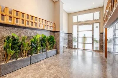 an empty room with a large aquarium with plants at Modern 1 Bedroom W Terrace- Rabat City Center in Rabat