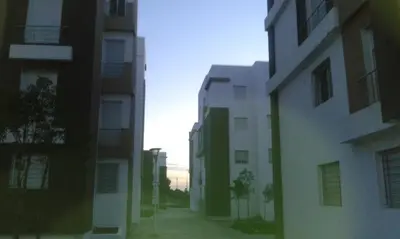 a view of an alley between two buildings at résidence les perles de Bouznika in Bouznika