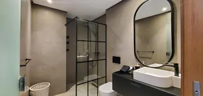 a bathroom with a sink and a mirror at Luxurious apartment casablanca in Casablanca