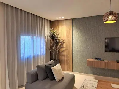 a living room with a couch and a window at Chahd appart centre de Rabat pour famille in Rabat