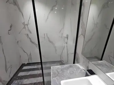 a white bathroom with a sink and a shower at Studio Seven Sky 1 - Close to CFC in Casablanca