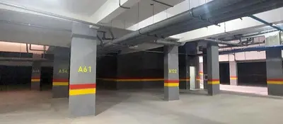 an empty parking lot with columns in a train station at Premium Romantic 1 Bedroom & Living Room with Swimming pool & Garden view in Casablanca