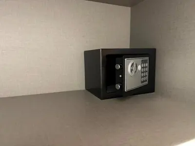 a safe in the corner of a room at Parking - Stunning View - Modern cozy and central in Casablanca