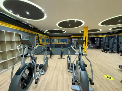 a gym with treadmills and elliptical machines at Ultimate ocean luxury in Tamaris