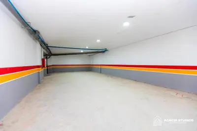 an empty room with colorful stripes on the walls at Acacia Studio 02 in Casablanca