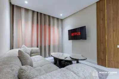 a living room with a couch and a table at Acacia Studio 05 in Casablanca