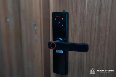 a black door handle on a wooden door at Acacia Studio 08 in Casablanca