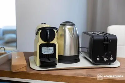 a coffee maker and a toaster sitting on a counter at Acacia Studio 11 in Casablanca