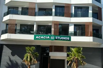 a building with a sign that reads acacia studios at Acacia Studio 15 in Casablanca