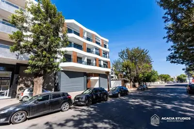 a group of cars parked in front of a building at Acacia Studio 15 in Casablanca