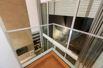 an overhead view of a balcony with a window at Beyti in Rabat