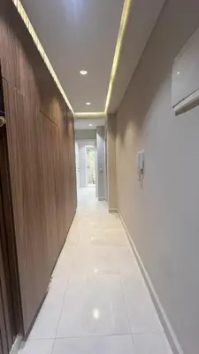 a long hallway with a tile floor and a wall at home garden in Casablanca