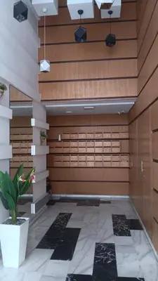 a lobby with wooden walls and a potted plant at Downtown delight studio in Casablanca