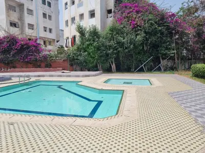 a swimming pool in the middle of a building at Bayt El Fath in Casablanca