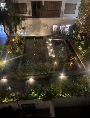 an overhead view of a garden at night at Badji in Casablanca