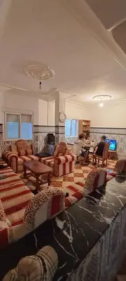 a large living room with couches and a couch at Blue Wave Apartment in Temara