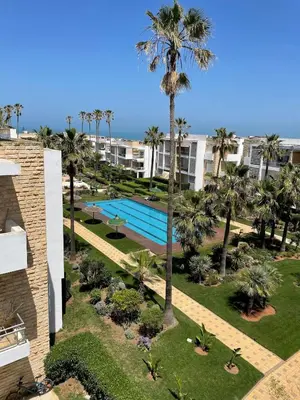an aerial view of a resort with a swimming pool at Beachside Charming Apartment in Tamaris