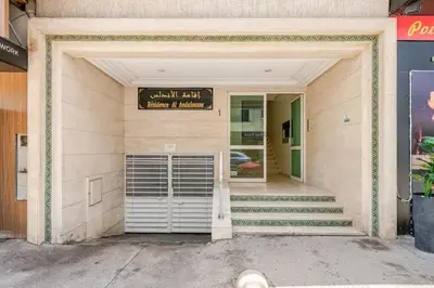 a front door of a building with a garage at Appartement Agdal, proche des stades in Rabat
