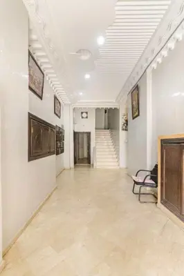 an empty hallway with a staircase in a building at Modern hideaway in Casablanca in Casablanca
