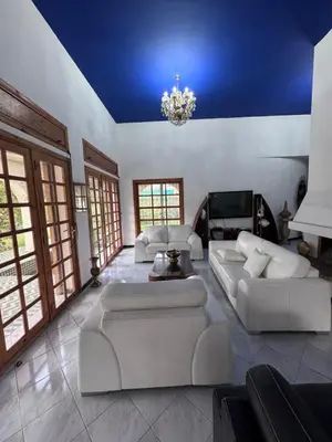 a living room with white couches and a blue ceiling at Villa élégante à Rabat,harhoura à 4 chambres in Rabat