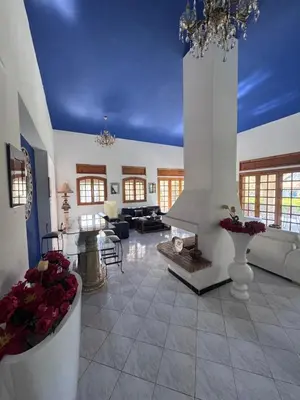 a large living room with a blue ceiling at Villa élégante à Rabat,harhoura à 4 chambres in Rabat