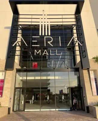 a store front of a mall with a sign on it at Appartement chic et cosy - Casablanca Finance City in Casablanca