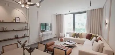 a living room with a couch and a table at AnfaPlace Residence, Casablanca, la Cornishe-Ain Diab in Casablanca