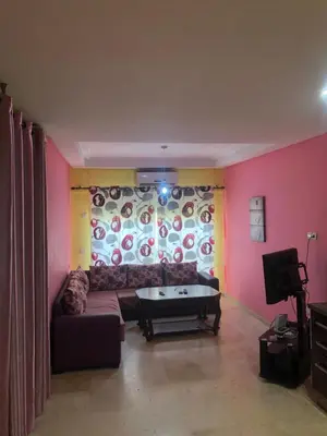 a living room with a couch and a table at Bea & dozo in Casablanca