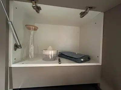 a shelf with a vase and a container on it at Chic & Design Loft À 5 Minutes de la Corniche in Casablanca