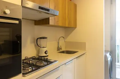 a kitchen with a blender on top of a stove at HM38 I Spacious & modern close to amenities in Casablanca