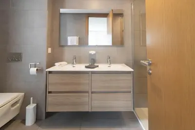 a bathroom with a sink and a mirror at HM38 I Spacious & modern close to amenities in Casablanca