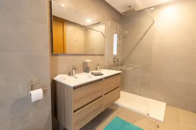 a bathroom with a sink and a shower at HM38 I Spacious & modern close to amenities in Casablanca