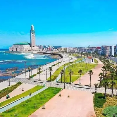 an aerial view of a city with a clock tower at Heart of Casablanca - Tramway in Casablanca