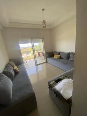 a living room with two couches and a couch at Ola Blanca 2 in Tamaris
