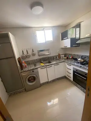 a kitchen with a sink and a dishwasher at Ola Blanca 2 in Tamaris