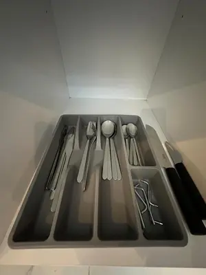 a kitchen sink with utensils on top of it at Sublime Cozy Chic Studio Condo in Downtown Casablanca in Casablanca