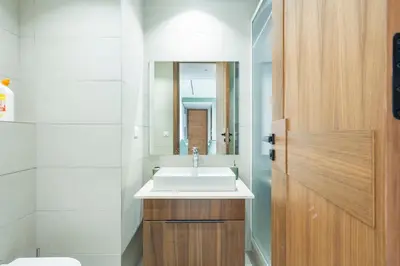 a bathroom with a sink and a mirror at Beautiful Apartment Best View in Casablanca