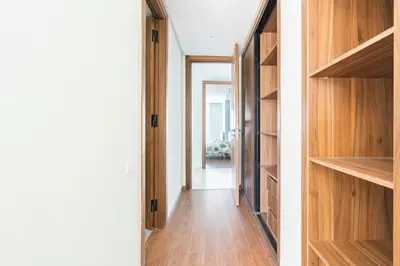 a hallway of a house with wooden shelves at Beautiful Apartment Best View in Casablanca