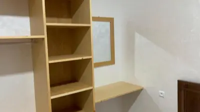 a empty book shelf in a room at Ferme a Ain Tizgha Benslimane in O Ben Slimane