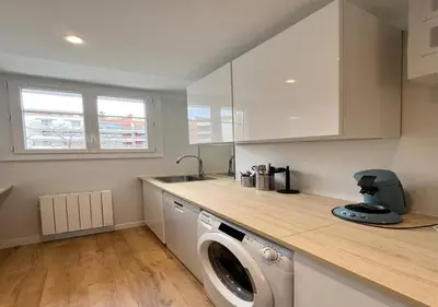 a kitchen with a washing machine on a counter at Appartement cosyy in Casablanca