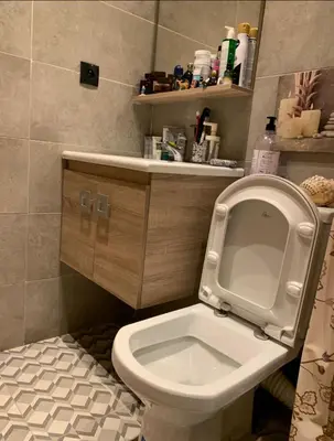 a bathroom with a toilet with the seat up at Hay al qods in Casablanca