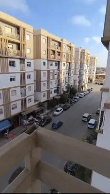 a view from a balcony of a parking lot at apartment a casablanca in Dar Ben Abdallah Ben Dehbi
