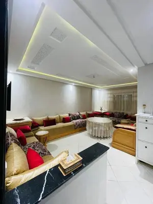 a large living room with couches and a table at Chic, quiet and convenient apartment in Casablanca