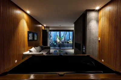a living room with a pool table at Villa l'Hermitage in Oulad Mbark