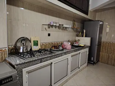 a kitchen with a stove and a refrigerator at fabulous Casablanca in Casablanca