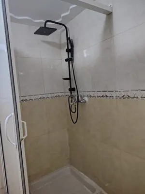 a shower with a shower head in a bathroom at fabulous Casablanca in Casablanca