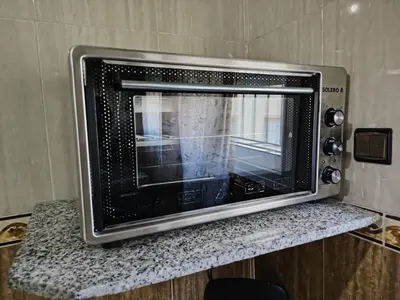 a microwave oven sitting on top of a counter at fabulous Casablanca in Casablanca